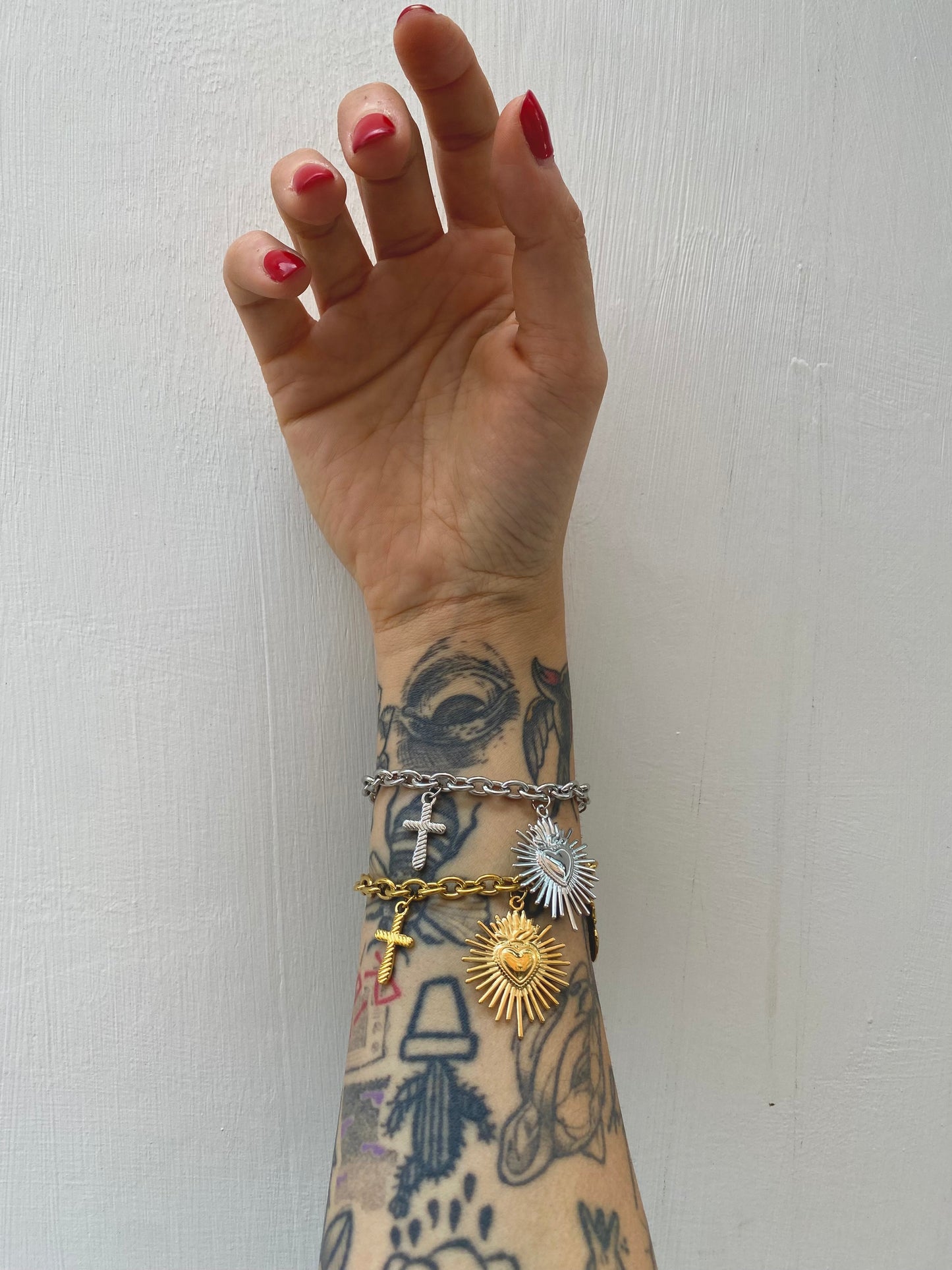 Bracciale multicharms Sacré