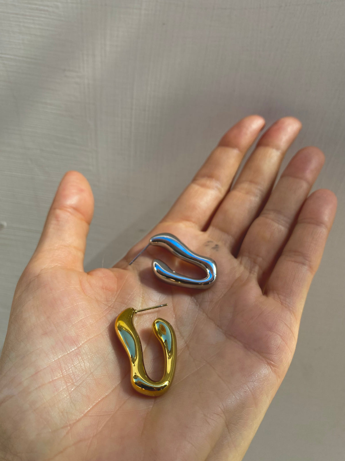 Orecchino Fluid