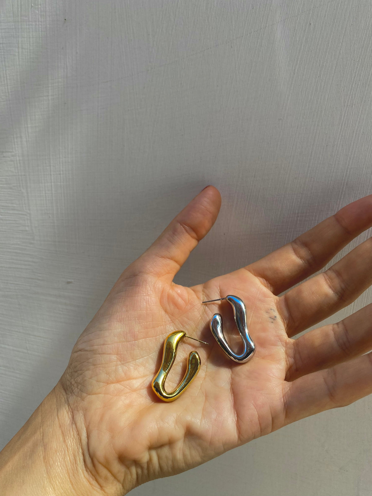 Orecchino Fluid