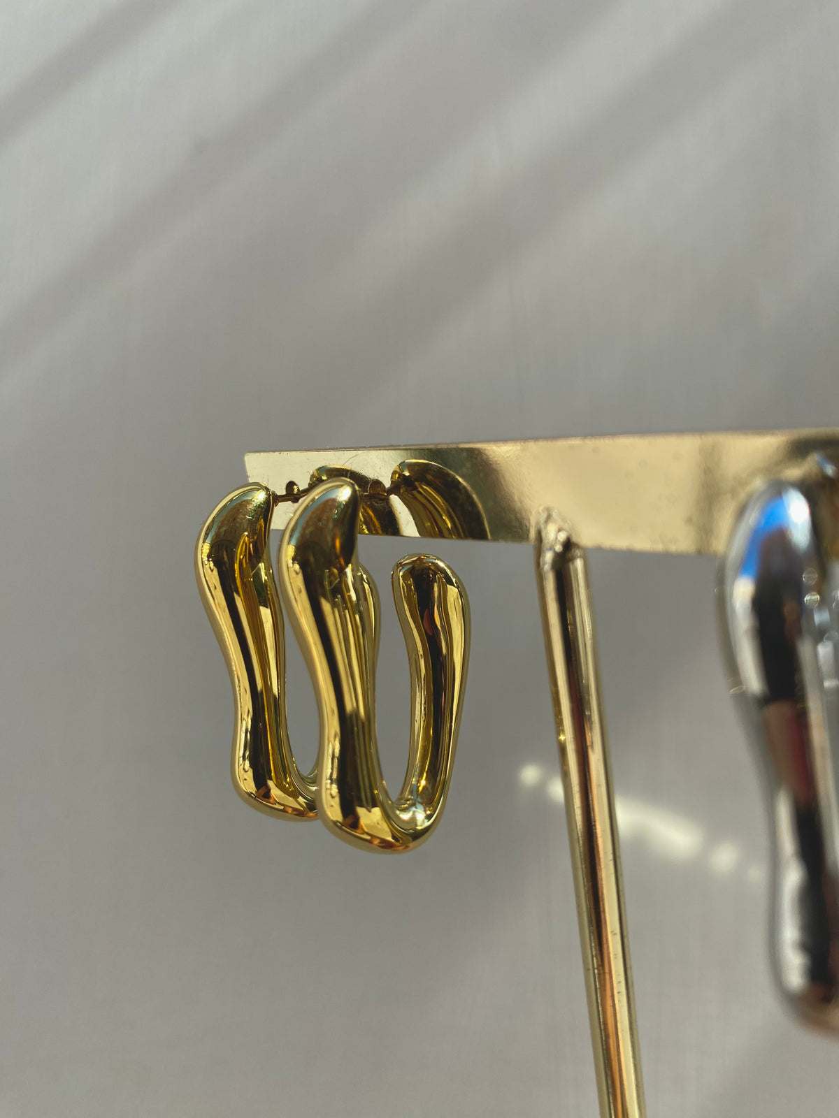 Orecchino Fluid