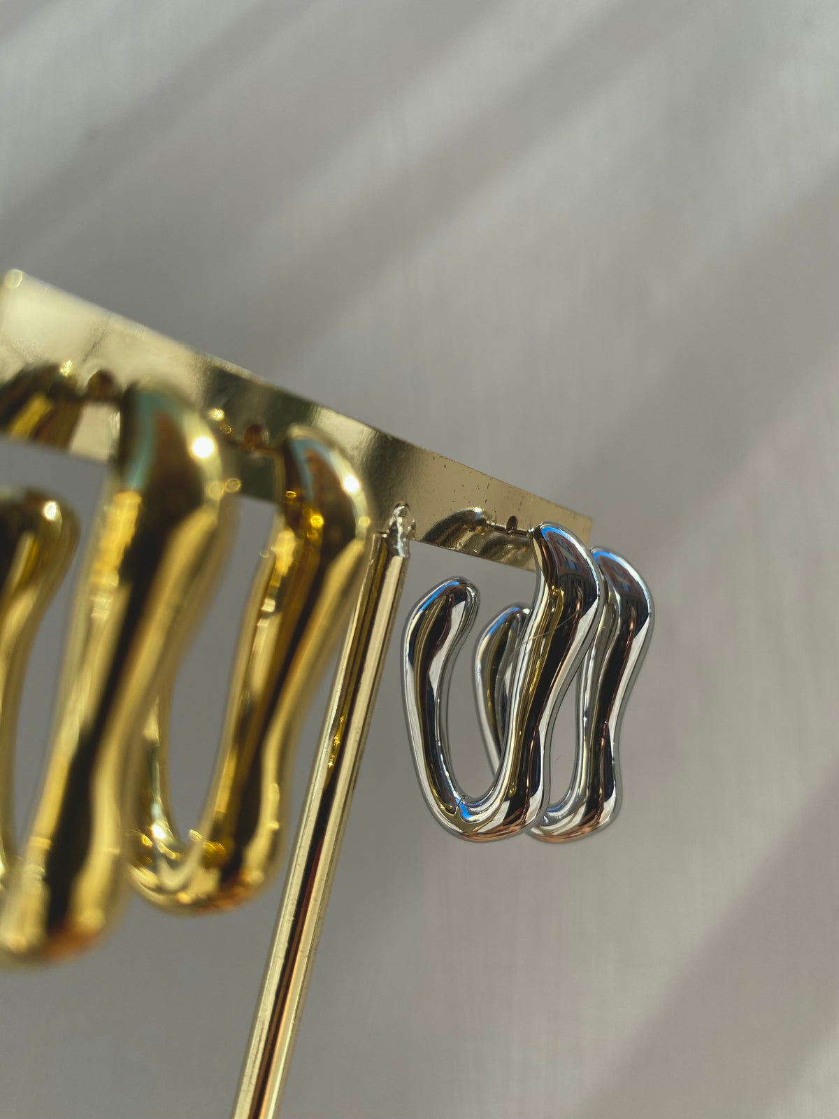 Orecchino Fluid